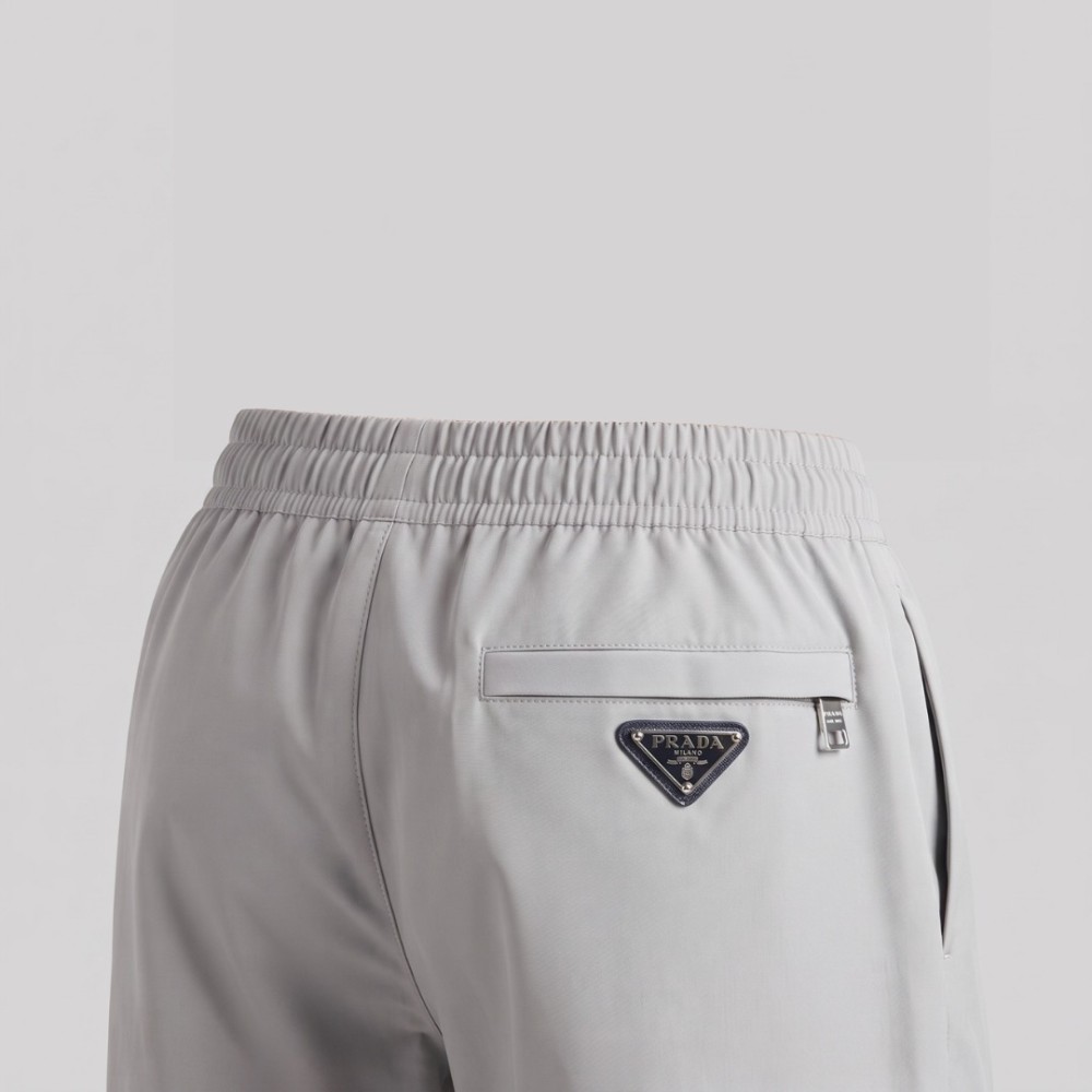 Grey Cotton Trousers with Metallic Triangle Logo Grey Cotton Trousers with Metallic Triangle Logo
