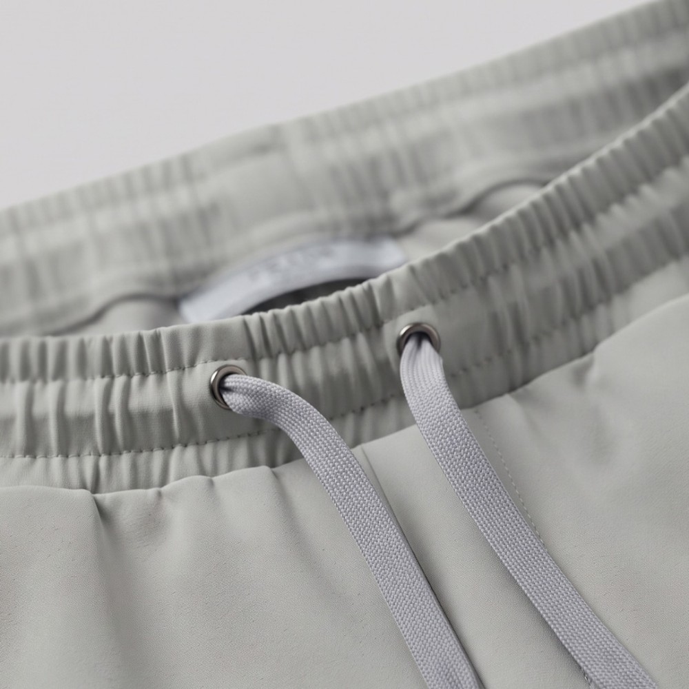 Grey Cotton Trousers with Metallic Triangle Logo Grey Cotton Trousers with Metallic Triangle Logo